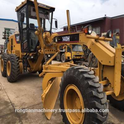 Running condition 185hp Japanese used cat 140H motor grader for sale in Shanghai site